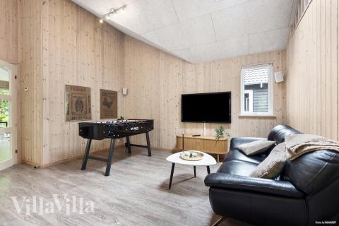 Aktivitätsraum im Luxusferienhaus Nr. 313 mit 7 Schlafzimmern und Platz für 18 Gäste.