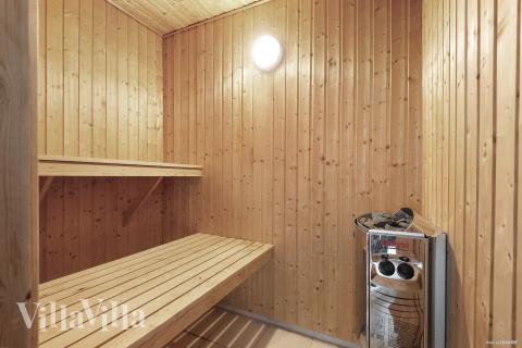 Genießen Sie die heiße Sauna im Luxusferienhaus Nr. 313 für 18 Personen