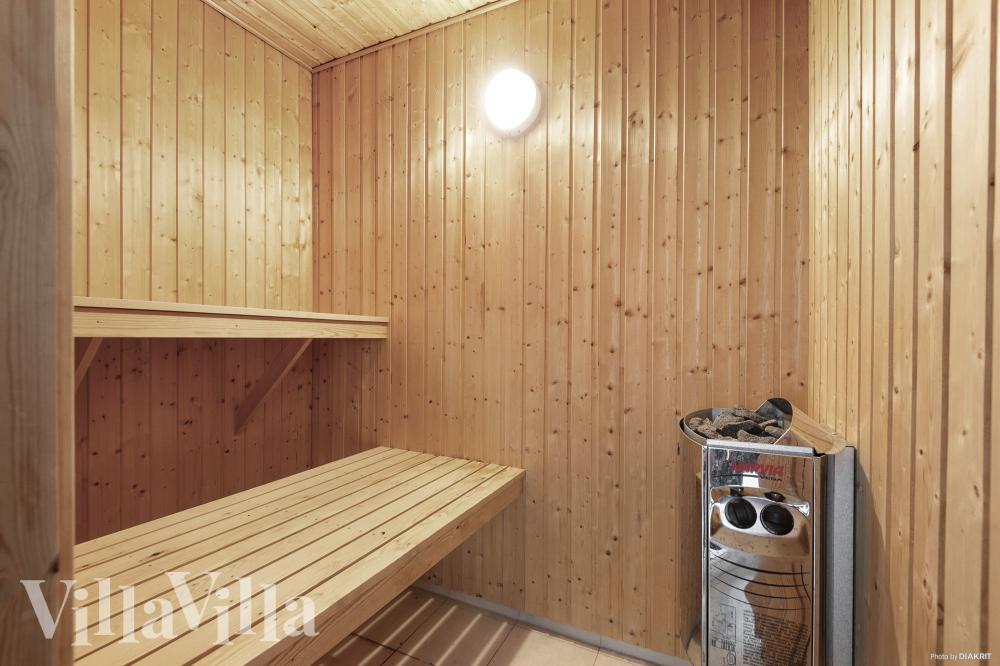 Genießen Sie die heiße Sauna im Luxusferienhaus Nr. 313 für 18 Personen