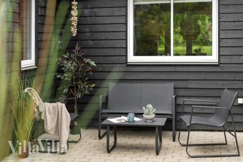 Genießen Sie einen Grillabend auf der Terrasse des Luxusferienhauses Nr. 313 in Westjütland