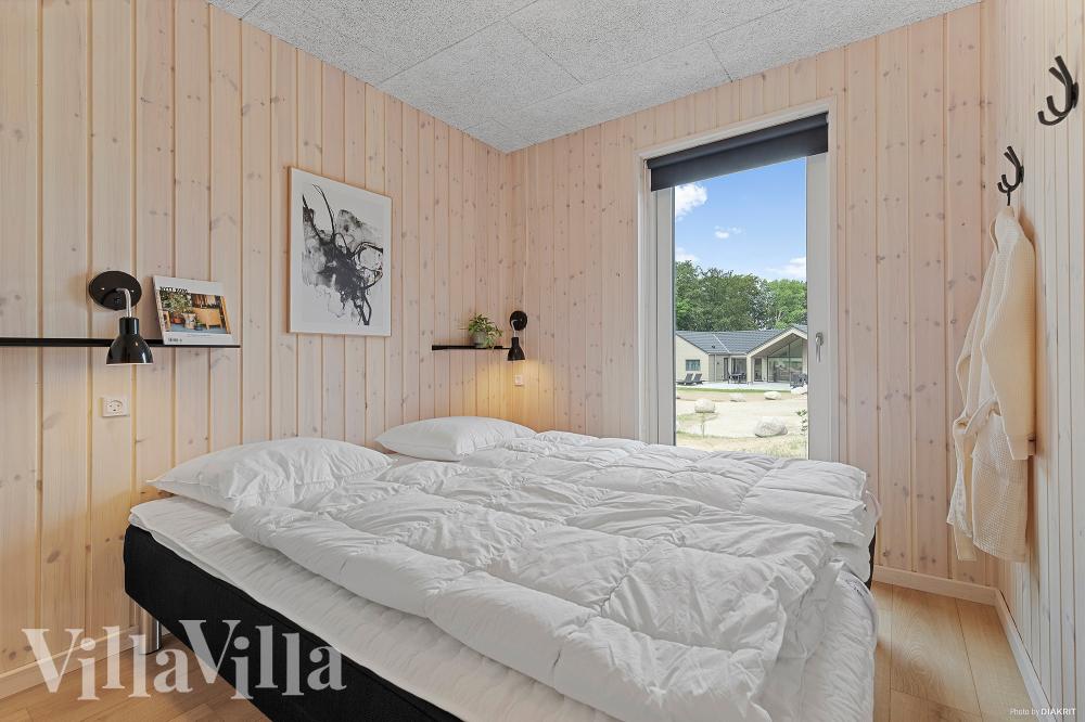 Eines der 10 Schlafzimmer im Luxusferienhaus Nr. 828
