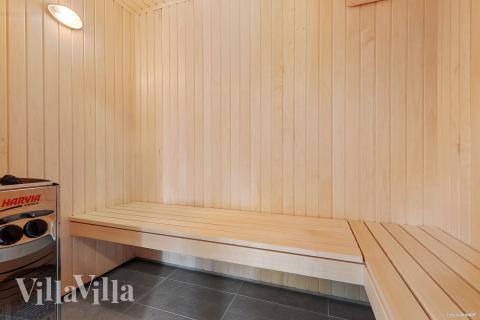 Genießen Sie die heiße Sauna im Luxusferienhaus Nr. 828 für 26 Personen