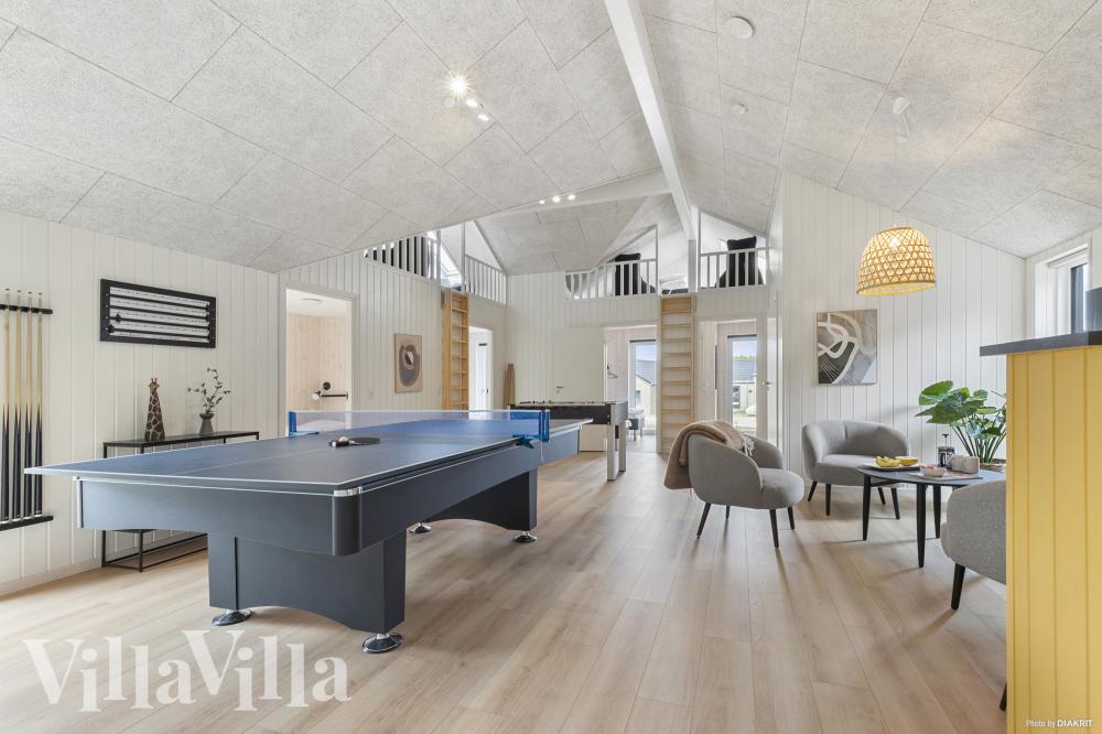 Neben den vielen schönen Stunden, die man im Poolbereich des Hauses verbringen kann, bietet das Luxusferienhaus 832 auch Spielevergnügen bei Billard/Tischtennis und Darts
