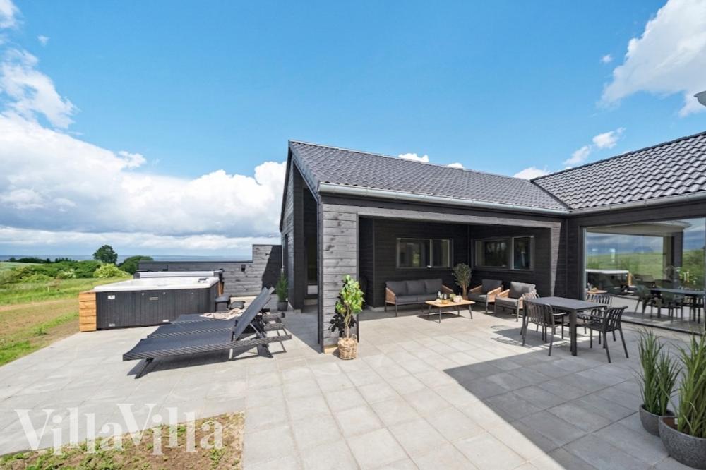 Das Luxusferienhaus Nr. 915 hat eine tolle Terrasse, die mit hochwertigen Gartenmöbeln für 16 Personen ausgestattet ist.