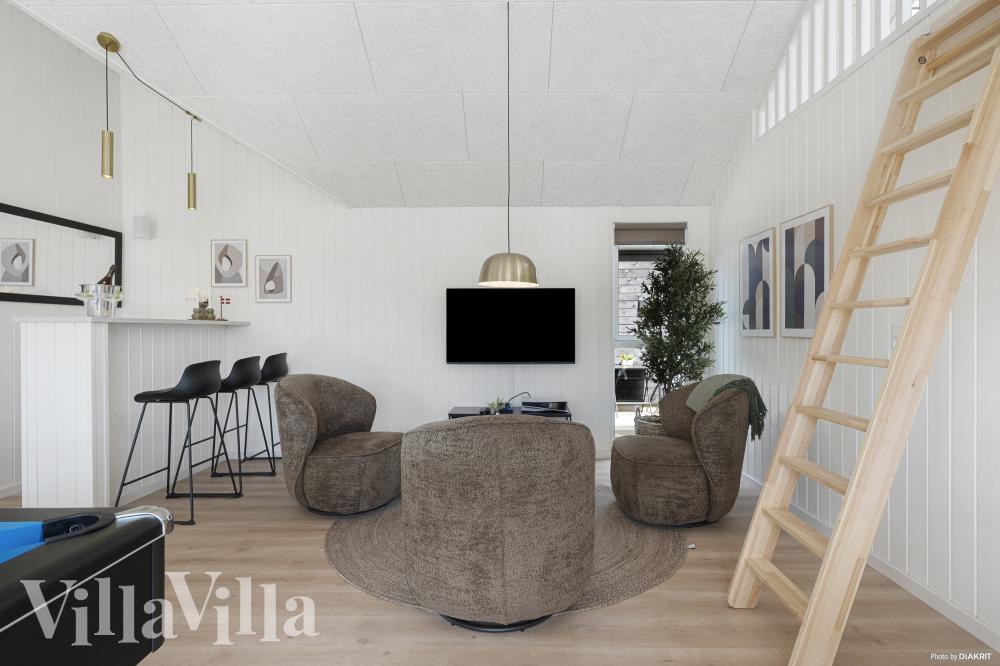 Das Luxusferienhaus 915 für 16 Personen hat einen großen Aktivitätsraum mit u. a. Billard und Darts