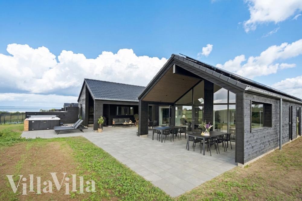 Dieses schöne Poolhaus Nr. 915 mit Platz für 16 Personen liegt in Fünen und seine Inseln