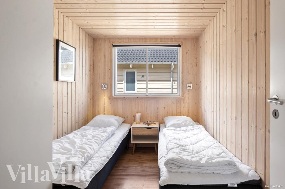 Eines der 7 Schlafzimmer im Luxusferienhaus Nr. 315