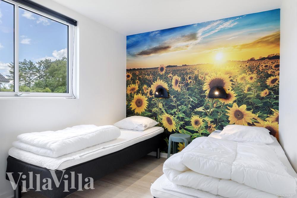 Eines der 12 Schlafzimmer im Luxusferienhaus Nr. 429