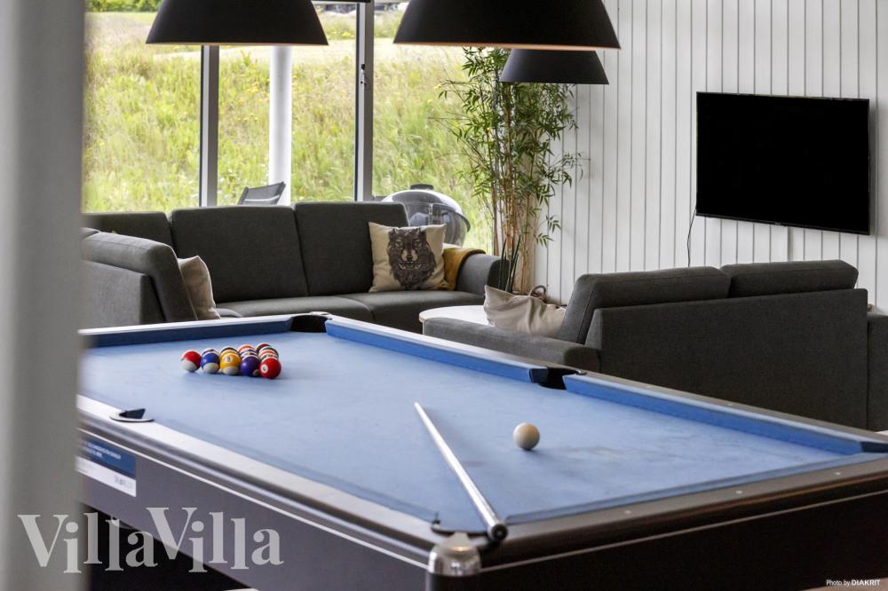 Das Luxusferienhaus 491 für 30 Personen hat einen großen Aktivitätsraum mit u. a. Billard und Darts