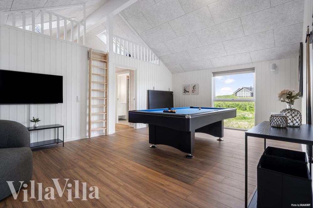 Neben den vielen schönen Stunden, die man im Poolbereich des Hauses verbringen kann, bietet das Luxusferienhaus 930 auch Spielevergnügen bei Billard/Tischtennis und Darts