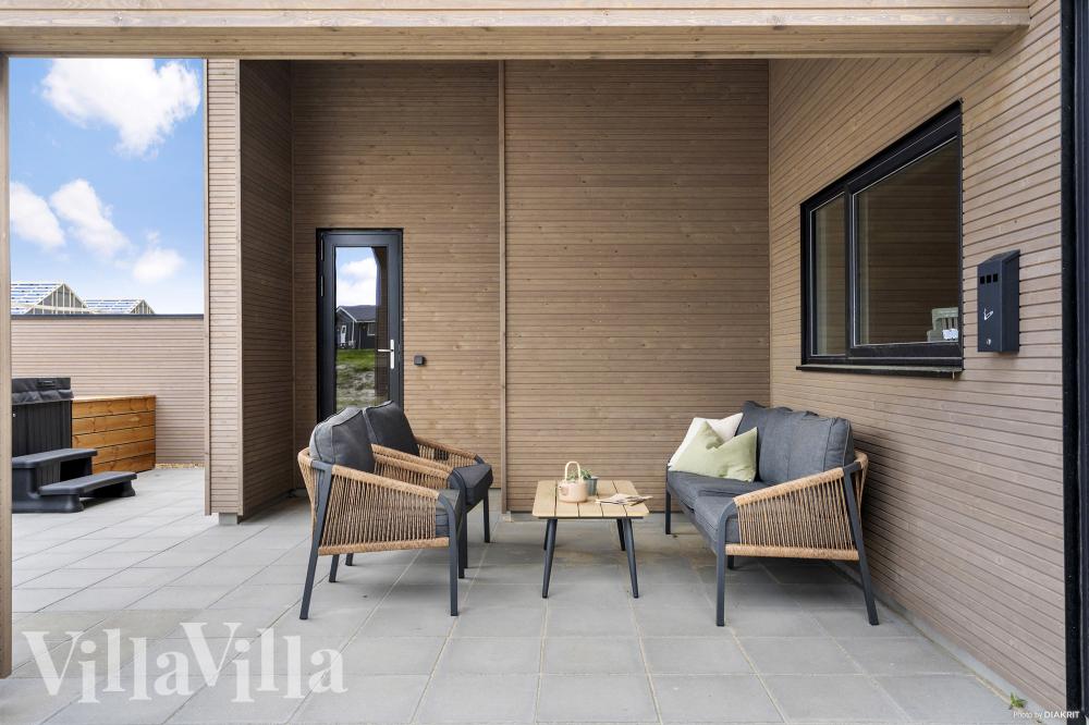 Das Luxusferienhaus Nr. 930 hat eine tolle Terrasse, die mit hochwertigen Gartenmöbeln für 14 Personen ausgestattet ist.