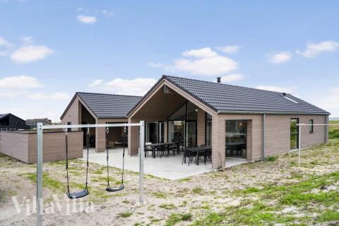 Dieses schöne Poolhaus Nr. 930 mit Platz für 14 Personen liegt in Westjütland