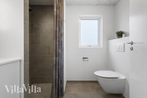 Eines der Badezimmer im Luxusferienhaus Nr. 930