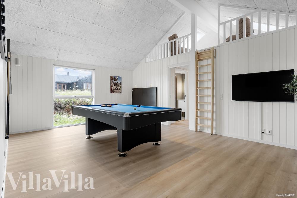 Neben den vielen schönen Stunden, die man im Poolbereich des Hauses verbringen kann, bietet das Luxusferienhaus 929 auch Spielevergnügen bei Billard/Tischtennis und Darts