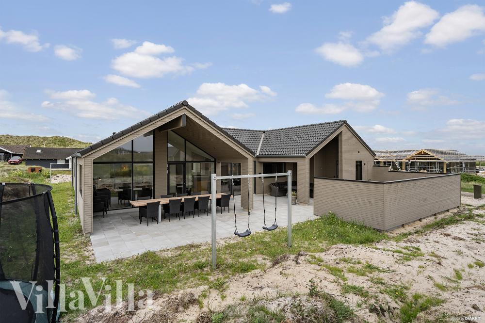 Dieses schöne Poolhaus Nr. 929 mit Platz für 14 Personen liegt in Westjütland