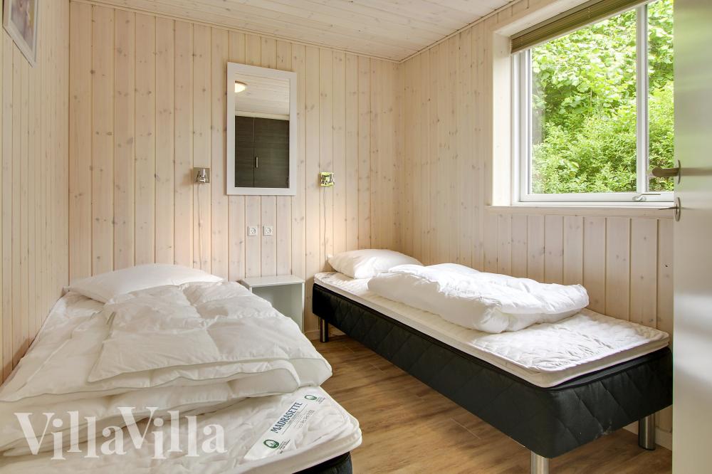 Eines der 7 Schlafzimmer im Luxusferienhaus Nr. 355