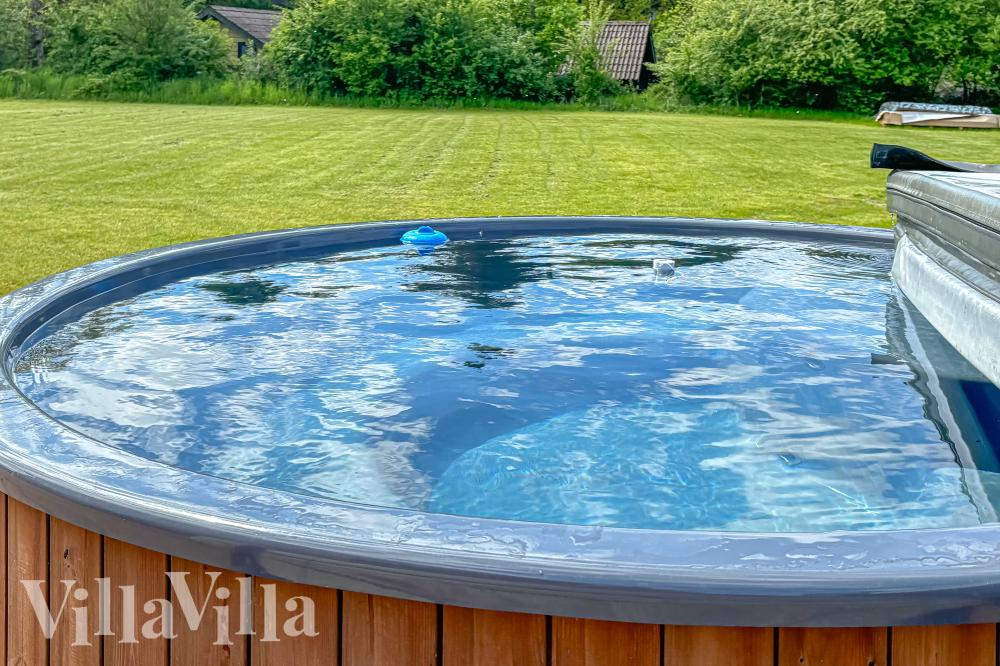Genießen Sie den warmen Whirlpool im Luxusferienhaus Nr. 981 in Limfjord