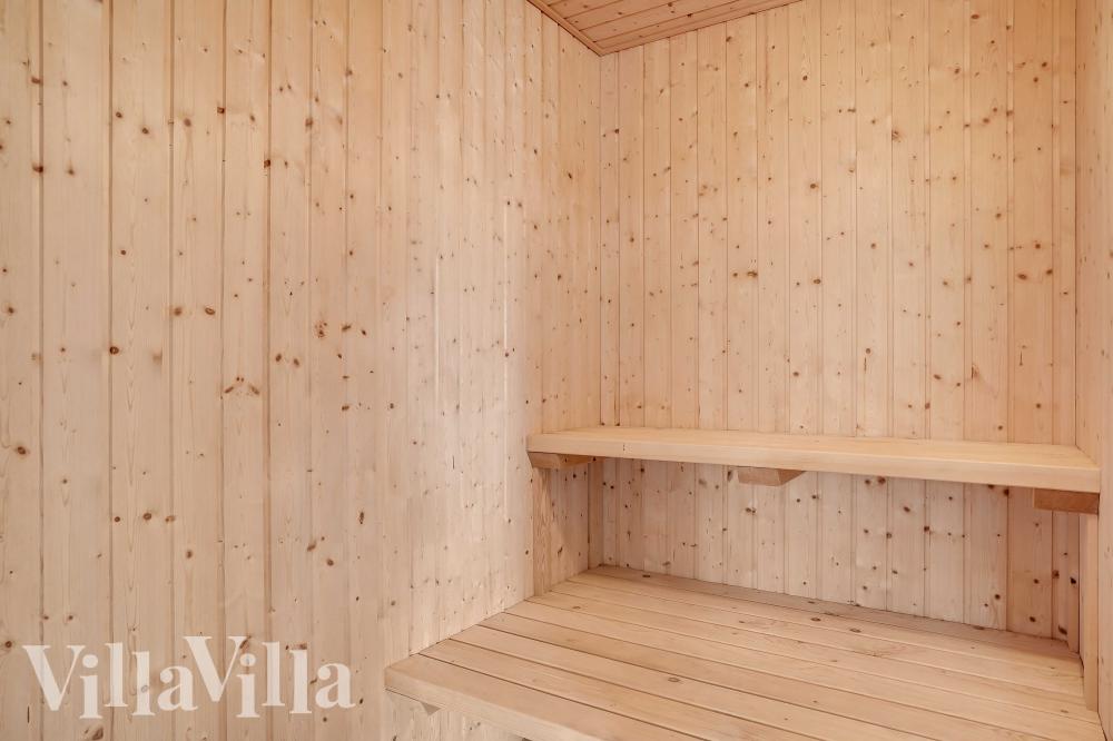 Genießen Sie die heiße Sauna im Luxusferienhaus Nr. 983 für 8 Personen
