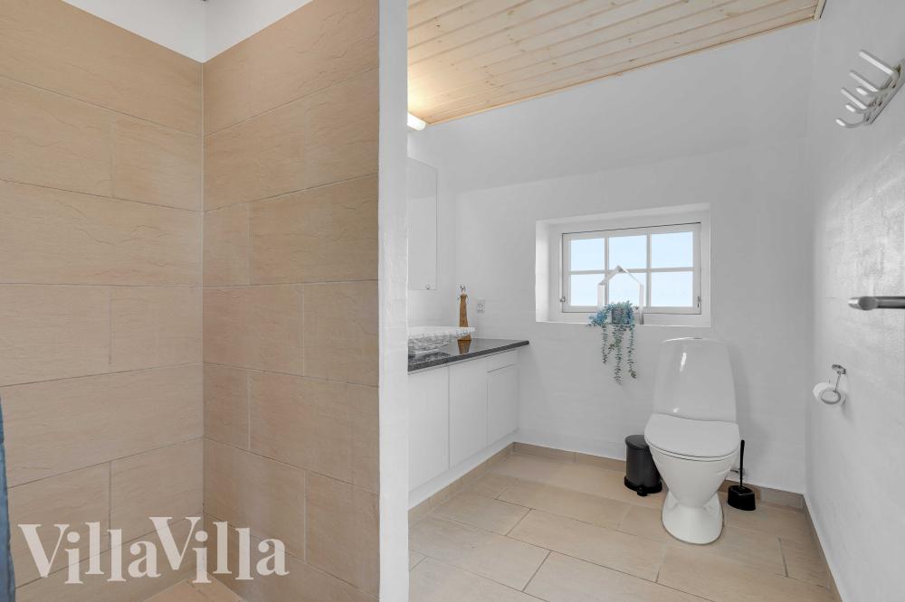 Eines der Badezimmer im Luxusferienhaus Nr. 982