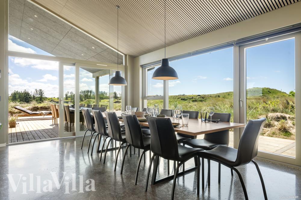 Aufenthaltsraum mit Platz für 12 im Luxusferienhaus Nr. 986.
