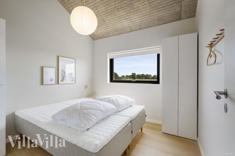 Eines der 6 Schlafzimmer im Luxusferienhaus Nr. 975