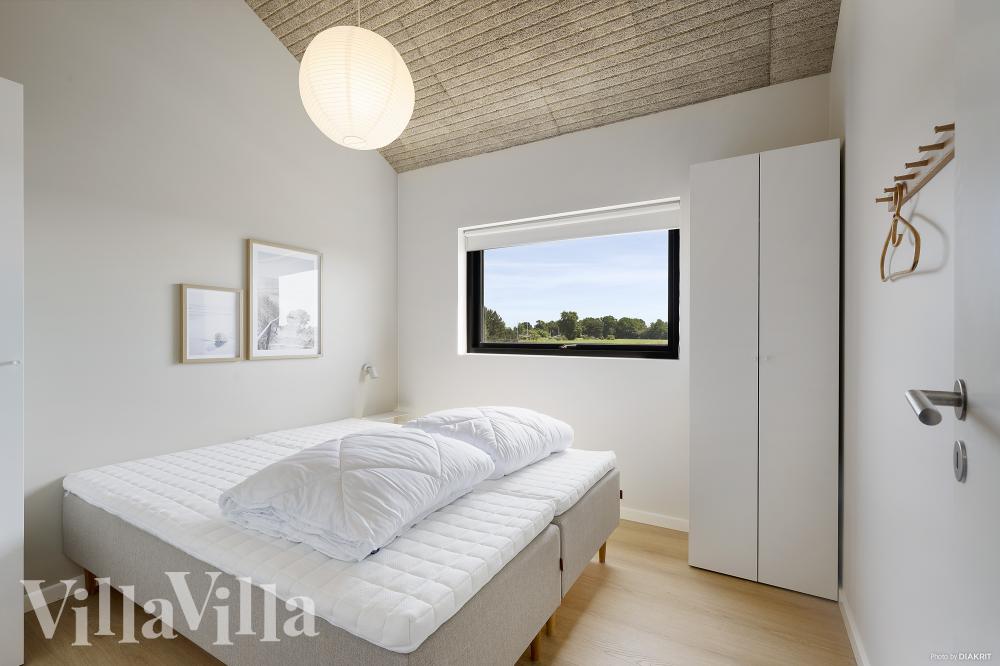 Eines der 6 Schlafzimmer im Luxusferienhaus Nr. 975