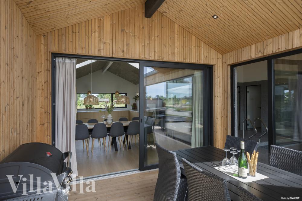 Genießen Sie einen Grillabend auf der Terrasse des Luxusferienhauses Nr. 975 in Fünen und seine Inseln