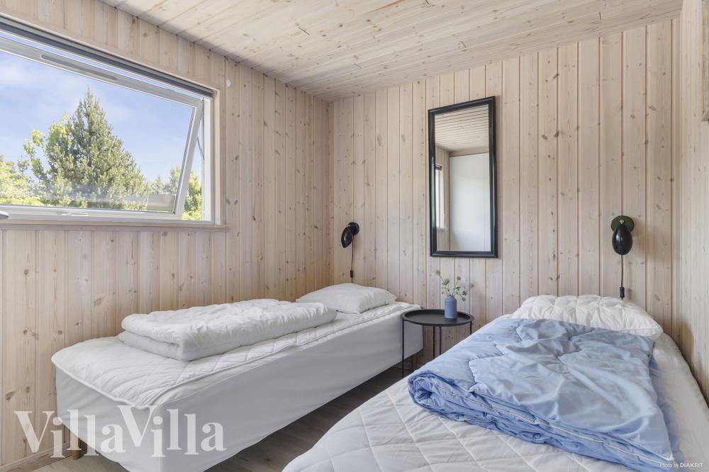 Eines der 6 Schlafzimmer im Luxusferienhaus Nr. 274