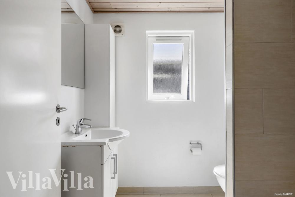 Eines der Badezimmer im Luxusferienhaus Nr. 274