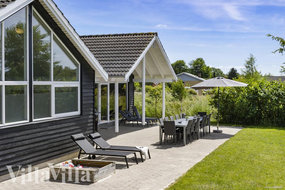 Das Luxusferienhaus Nr. 274 hat eine tolle Terrasse, die mit hochwertigen Gartenmöbeln für 16 Personen ausgestattet ist.