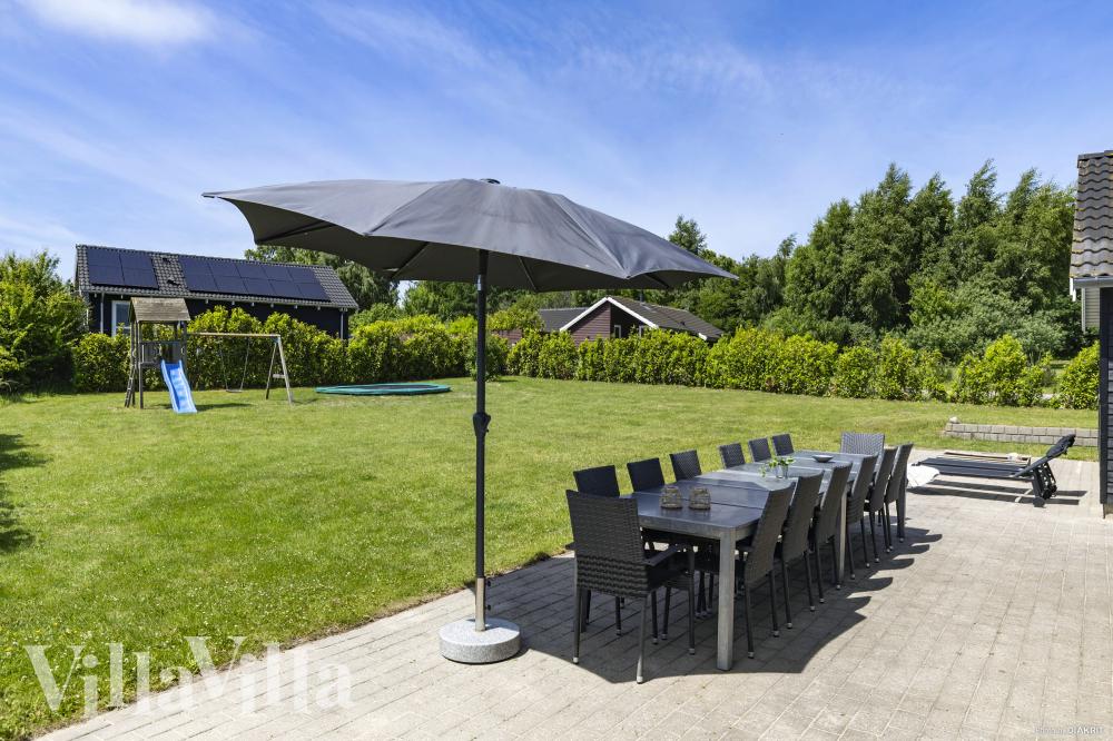 Genießen Sie einen Grillabend auf der Terrasse des Luxusferienhauses Nr. 274 in Nordseeland