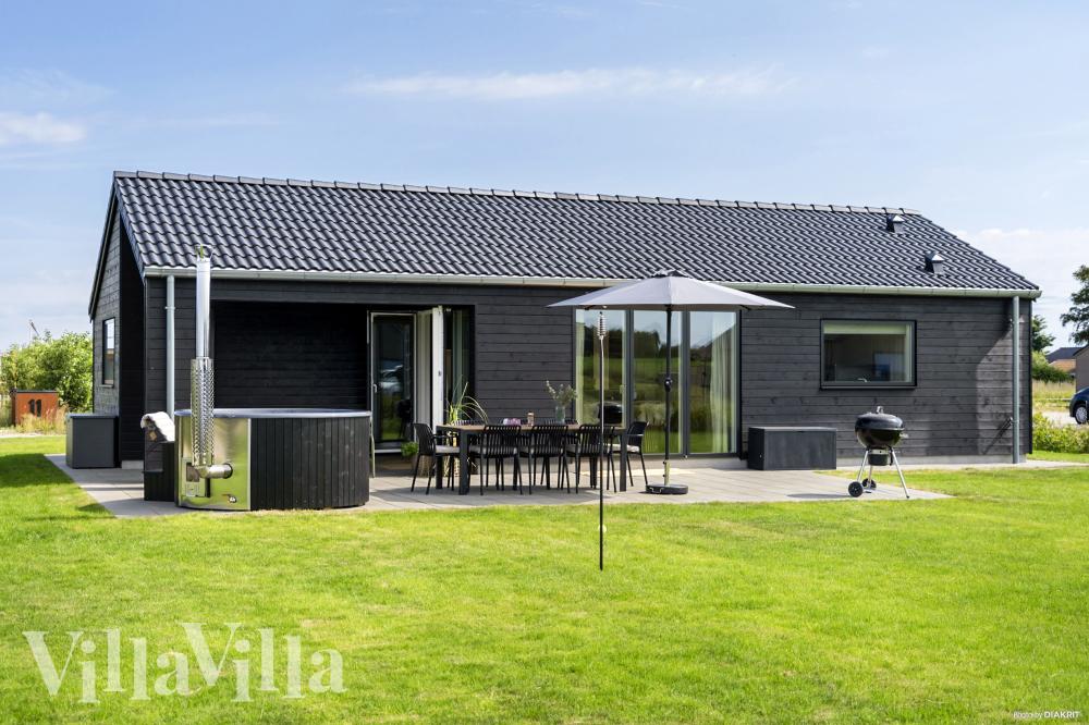 Diese schicke Haus mit Whirlpool Nr. 942 mit Platz für 8 Personen liegt in Fünen und seine Inseln