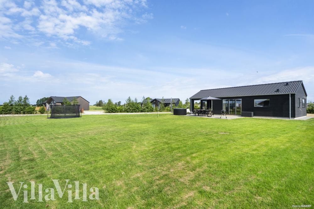 Zu dem attraktiven Ferienhaus Nr. 942 in Fünen und seine Inseln gehört auch ein tolles Angebot im Außenbereich, z. B. Spieleturm und Schaukeln