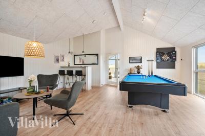 Neben den vielen schönen Stunden, die man im Poolbereich des Hauses verbringen kann, bietet das Luxusferienhaus 957 auch Spielevergnügen bei Billard/Tischtennis und Darts