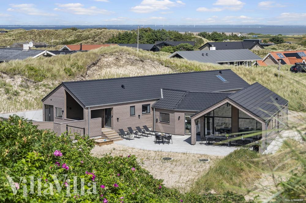 Dieses schöne Poolhaus Nr. 900 mit Platz für 18 Personen liegt in Westjütland