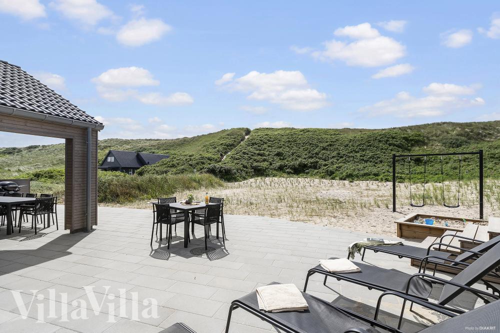 Das Luxusferienhaus Nr. 900 hat eine tolle Terrasse, die mit hochwertigen Gartenmöbeln für 18 Personen ausgestattet ist.