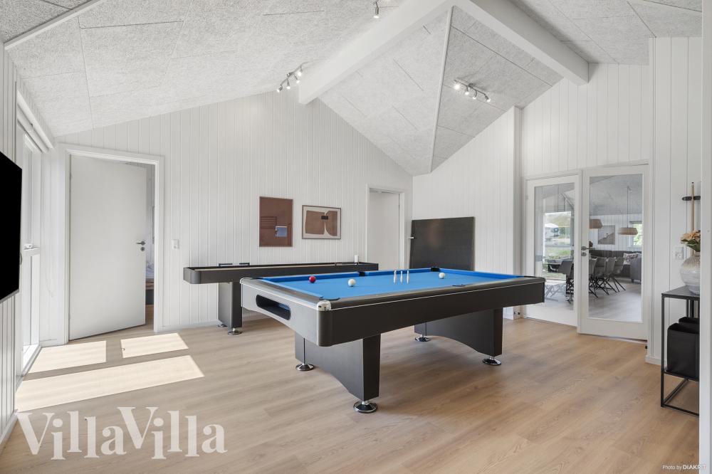 Neben den vielen schönen Stunden, die man im Poolbereich des Hauses verbringen kann, bietet das Luxusferienhaus 958 auch Spielevergnügen bei Billard/Tischtennis und Darts