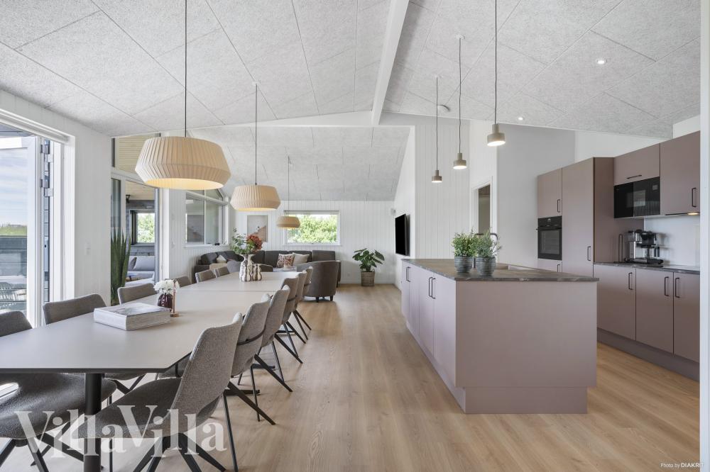 Aufenthaltsraum mit Platz für 12 im Luxusferienhaus Nr. 958.