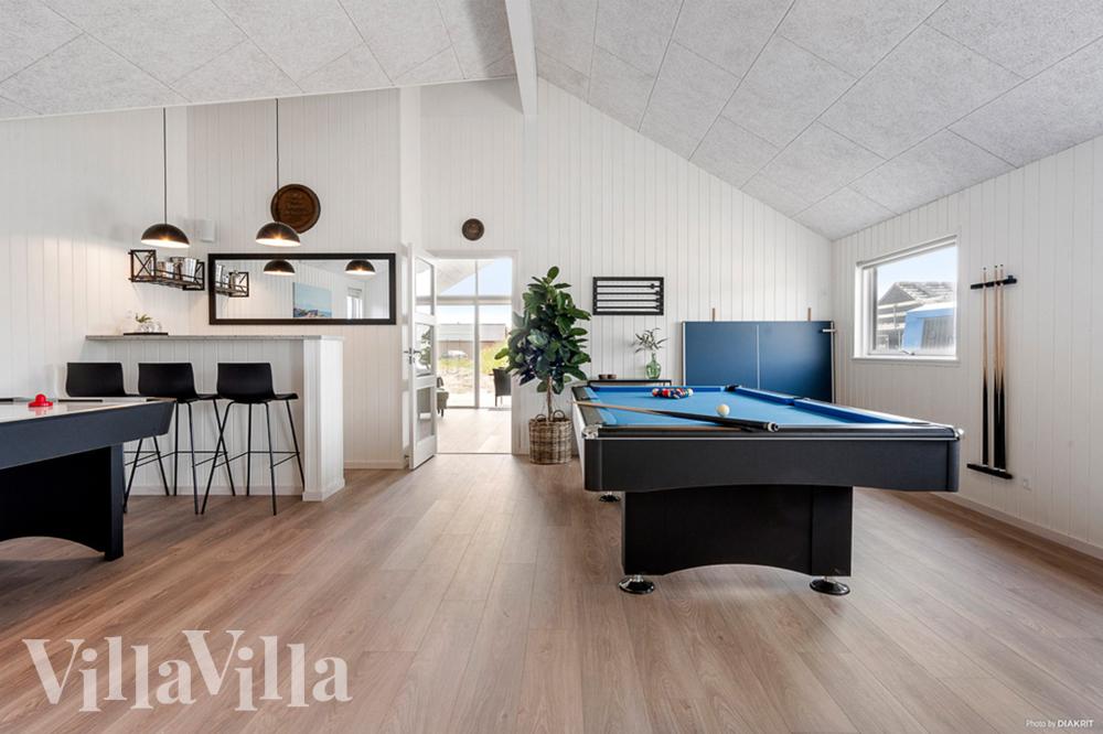 Neben den vielen schönen Stunden, die man im Poolbereich des Hauses verbringen kann, bietet das Luxusferienhaus 943 auch Spielevergnügen bei Billard/Tischtennis und Darts