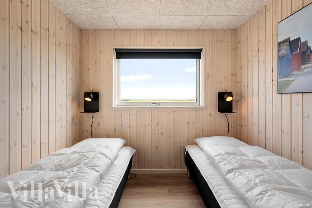 Eines der 7 Schlafzimmer im Luxusferienhaus Nr. 943