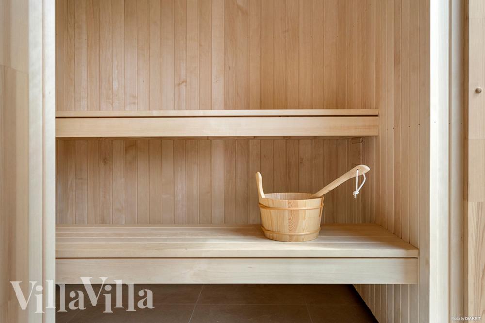 Genießen Sie die heiße Sauna im Luxusferienhaus Nr. 943 für 18 Personen