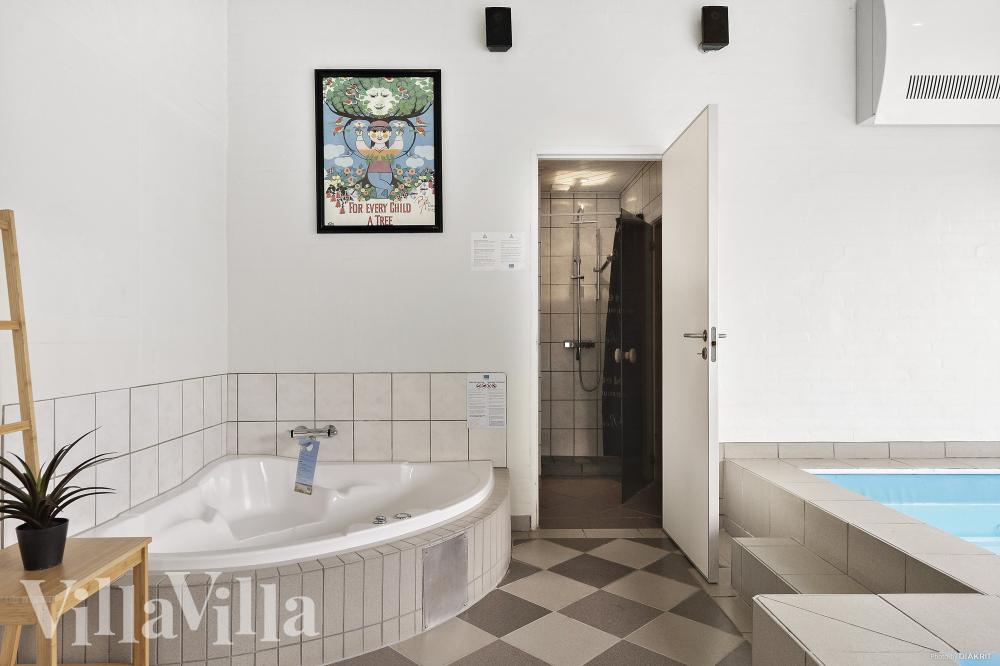 Genießen Sie den warmen Whirlpool im Luxusferienhaus Nr. 974 in Westjütland