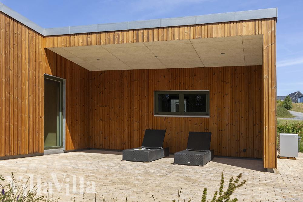 Genießen Sie einen Grillabend auf der Terrasse des Luxusferienhauses Nr. 988 in Limfjord