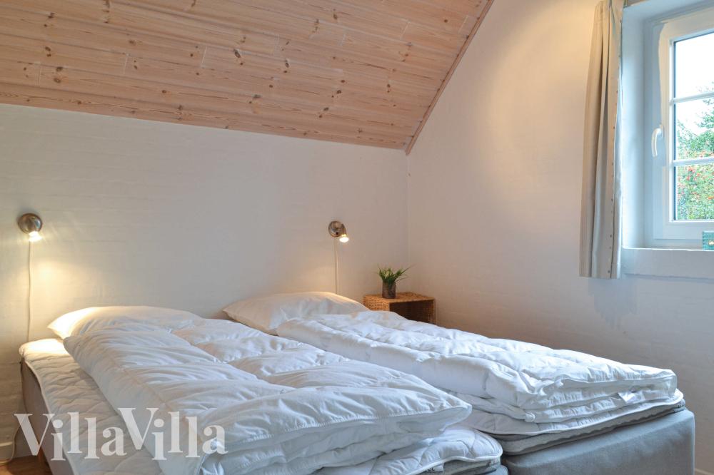 Eines der 6 Schlafzimmer im Luxusferienhaus Nr. 989