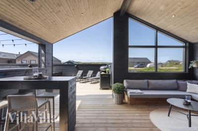 Das Luxusferienhaus Nr. 947 hat eine tolle Terrasse, die mit hochwertigen Gartenmöbeln für 12 Personen ausgestattet ist.