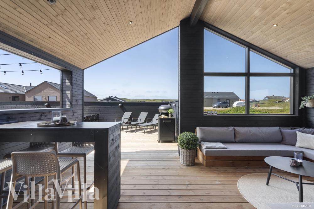 Das Luxusferienhaus Nr. 947 hat eine tolle Terrasse, die mit hochwertigen Gartenmöbeln für 12 Personen ausgestattet ist.