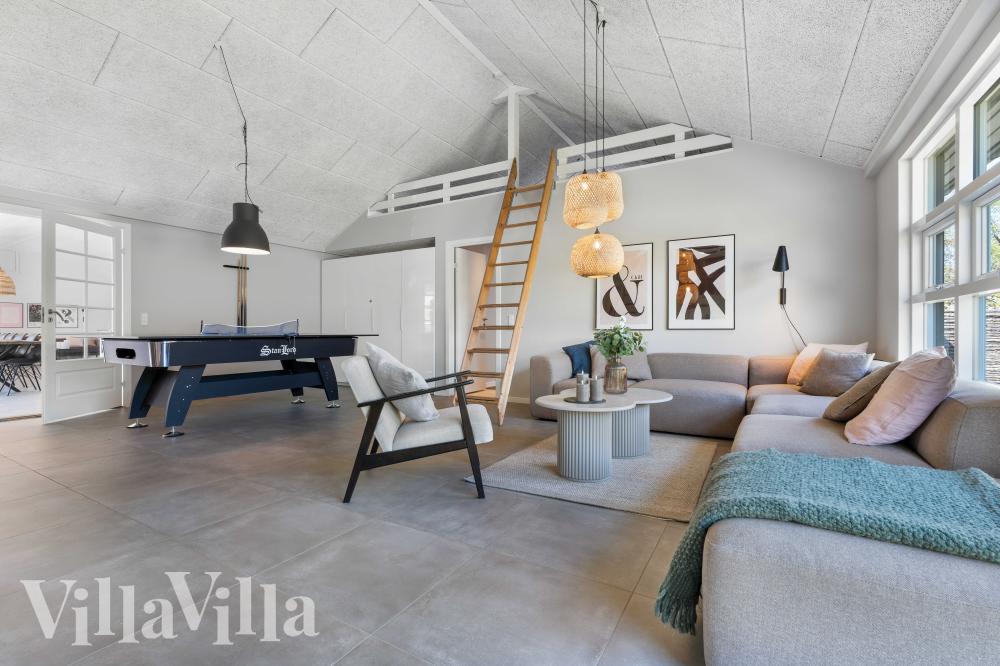 Das Luxusferienhaus 991 für 30 Personen hat einen großen Aktivitätsraum mit u. a. Billard und Darts