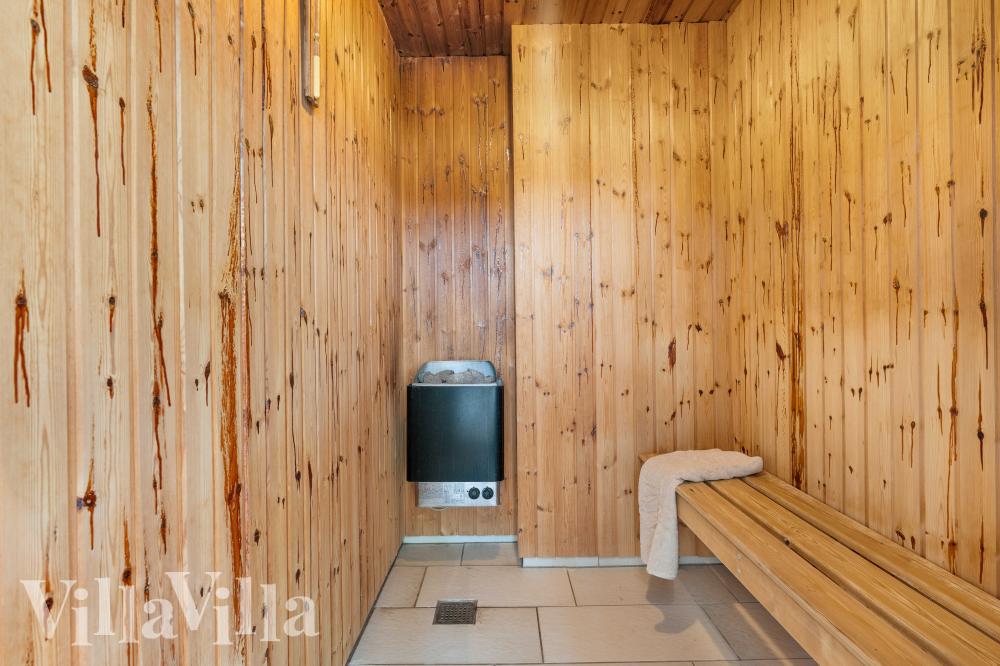 Genießen Sie die heiße Sauna im Luxusferienhaus Nr. 991 für 30 Personen