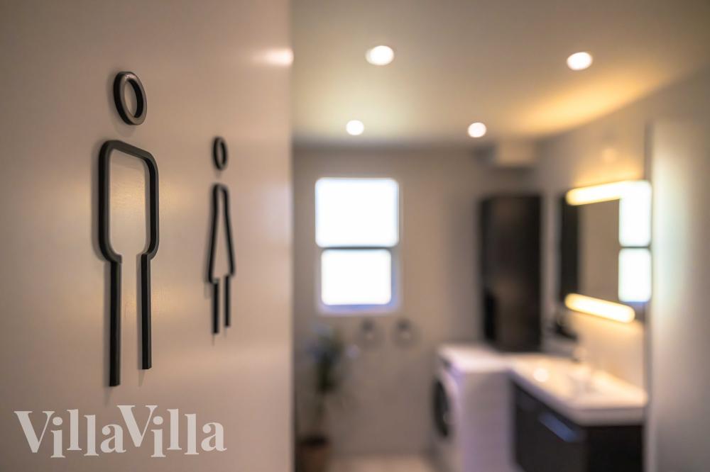 Eines der Badezimmer im Luxusferienhaus Nr. 991