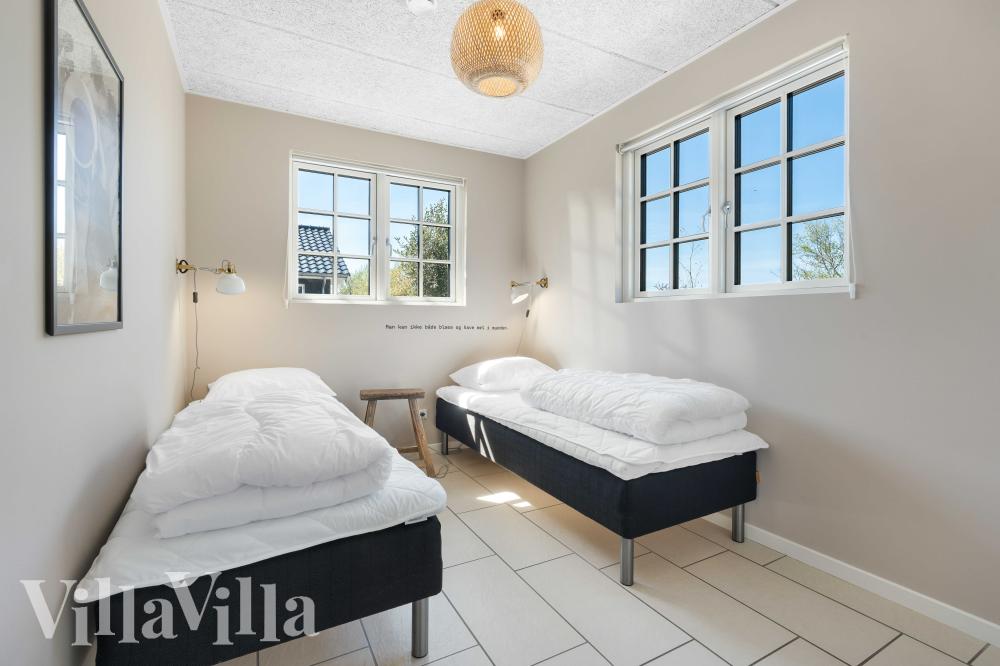 Eines der 12 Schlafzimmer im Luxusferienhaus Nr. 991